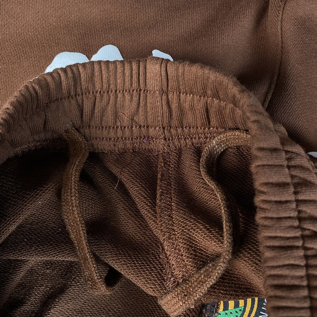 DENIM TEARS COTTON WREATH SHORTS BROWN - close up - replica sneakers