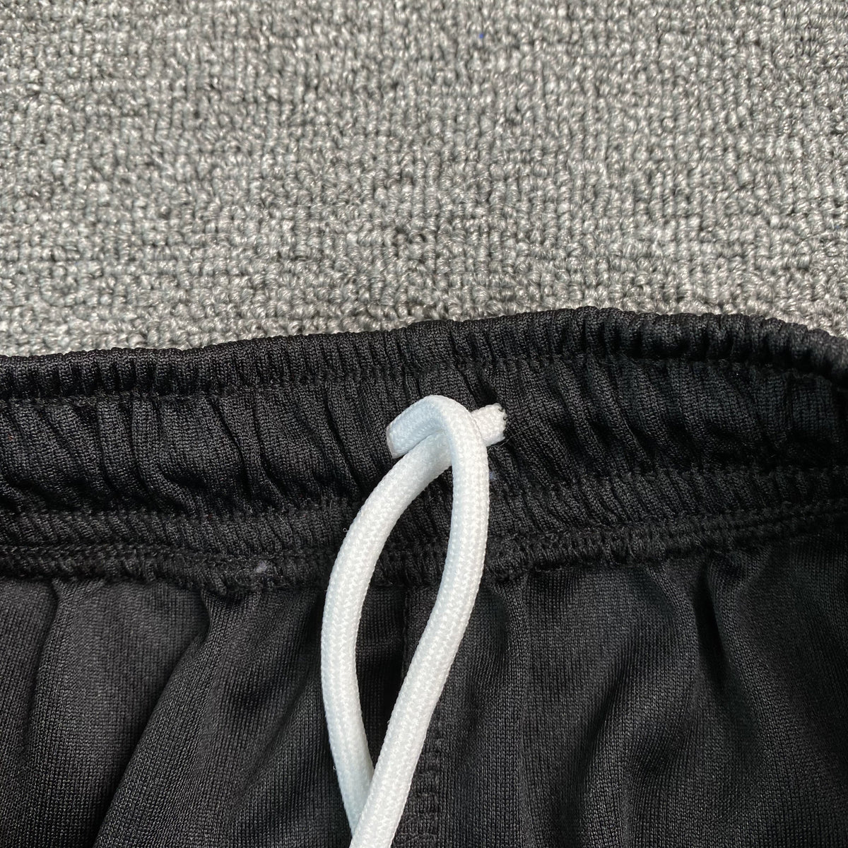 ERIC EMANUEL EE BASIC SHORTS BLACK/RED - close up - replica sneakers