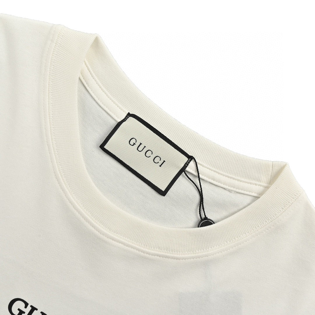 Gucci Mystical Eye Graphic T-shirt - White Unisex Streetwear Limited Edition - This Gucci t-shirt features a striking central eye graphic surrounded by rays and stars, creating