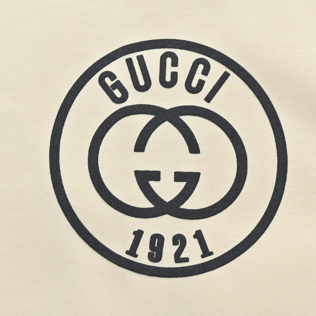 Gucci 1921 Logo Graphic T-Shirt (Beige) - detail - replica sneakers