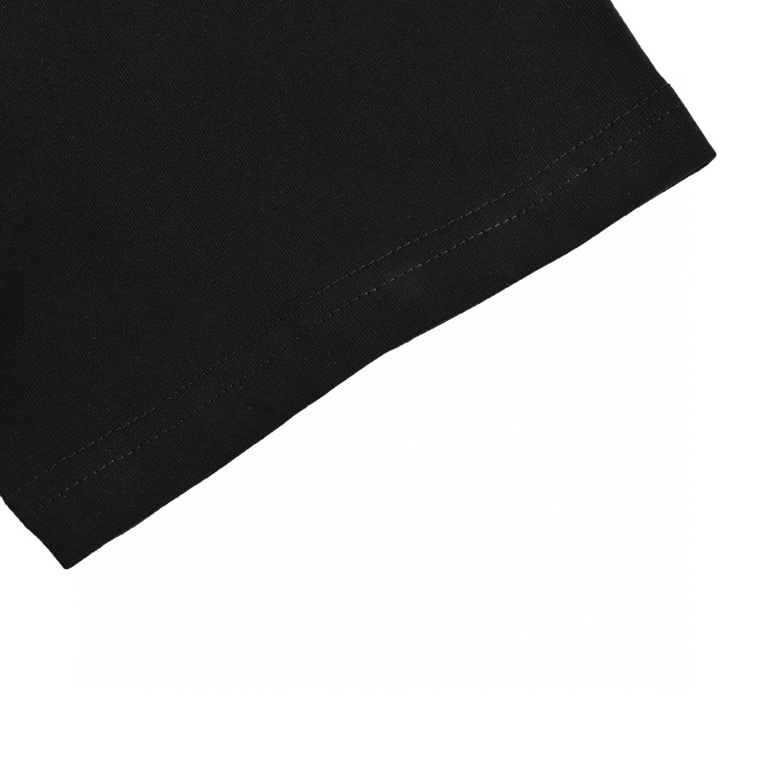 Chanel Classic Logo T-Shirt in Black - close up - replica sneakers