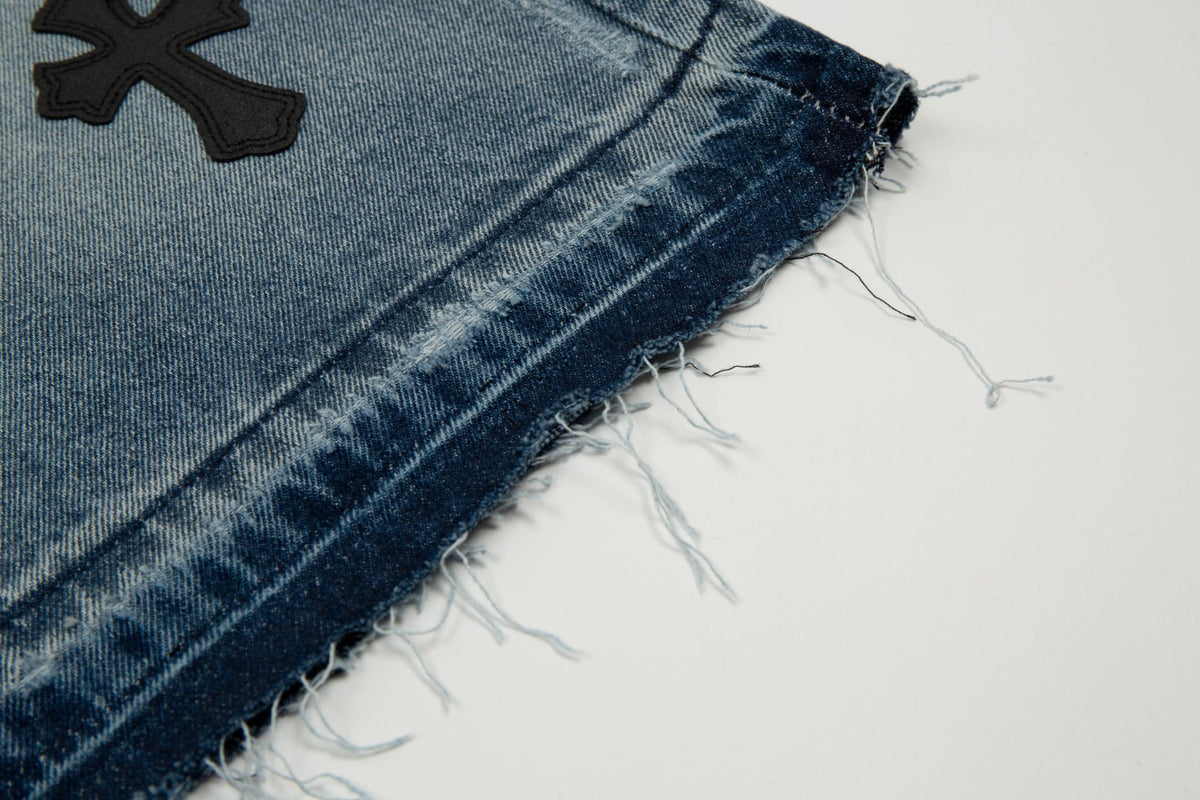 CHROME HEARTS CROSS PATCH BLACK EDGE JORTS WASHED DENIM - close up - replica sneakers