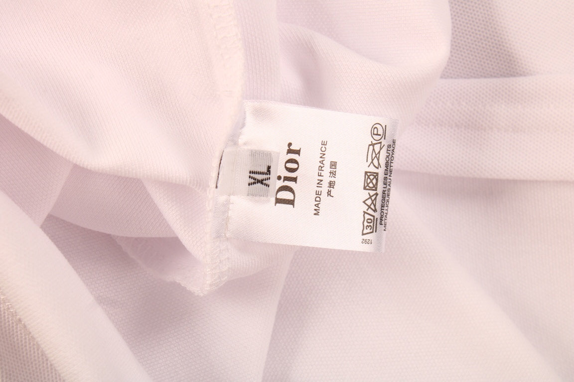 Dior Polo Shirt with Floral Logo Design - close up - replica sneakers
