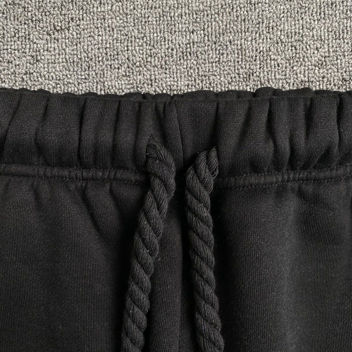SYNA WORLD SYNA LOGO SWEATPANTS BLACK - close up - replica sneakers