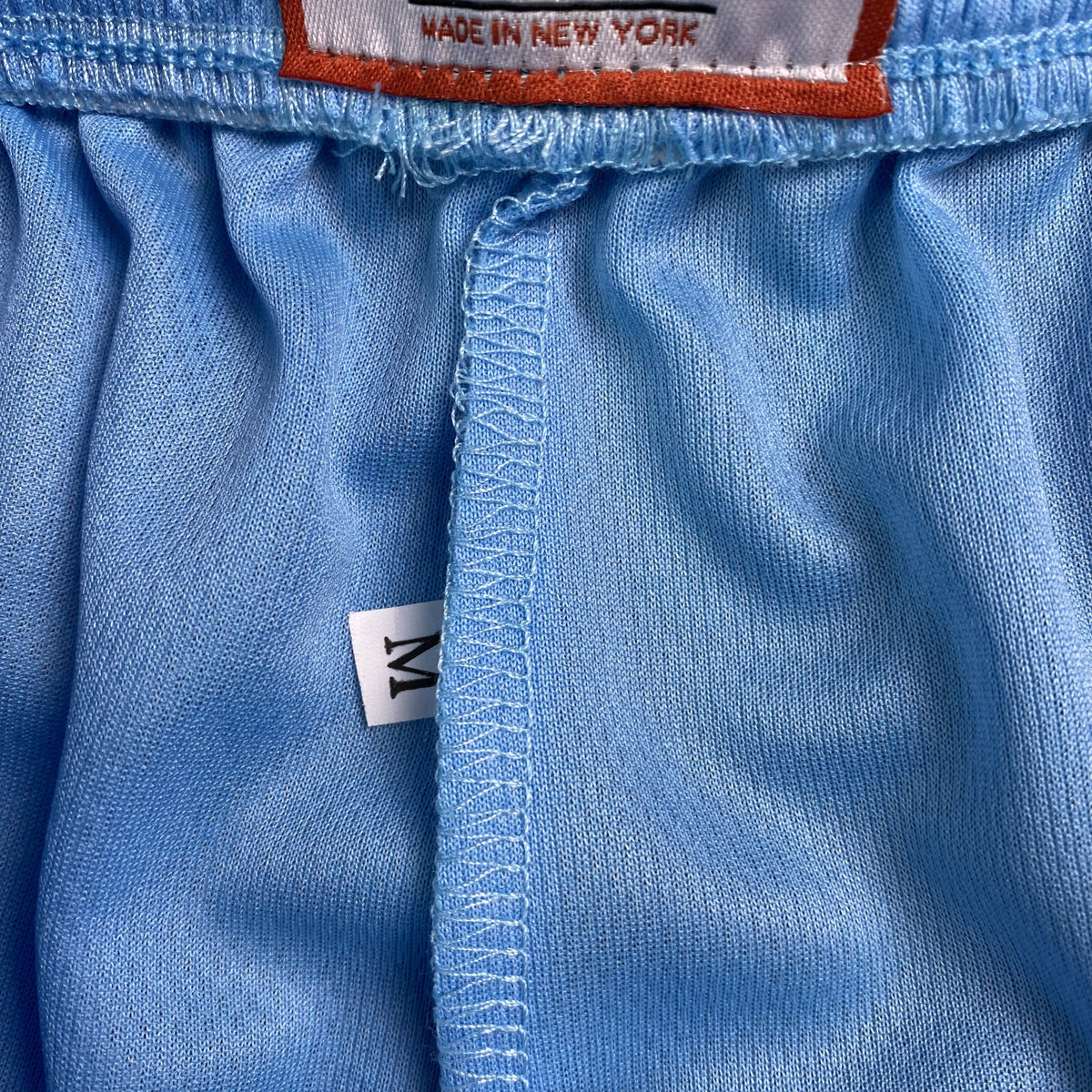 ERIC EMANUEL EE BASIC SHORTS CAROLINA BLUE/ORANGE - close up - replica sneakers