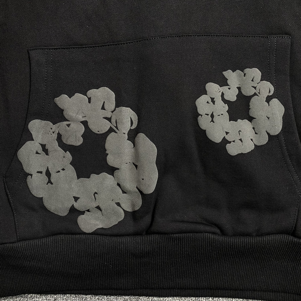 DENIM TEARS COTTON WREATH HOODIE MONOCHROME BLACK - close up - replica sneakers
