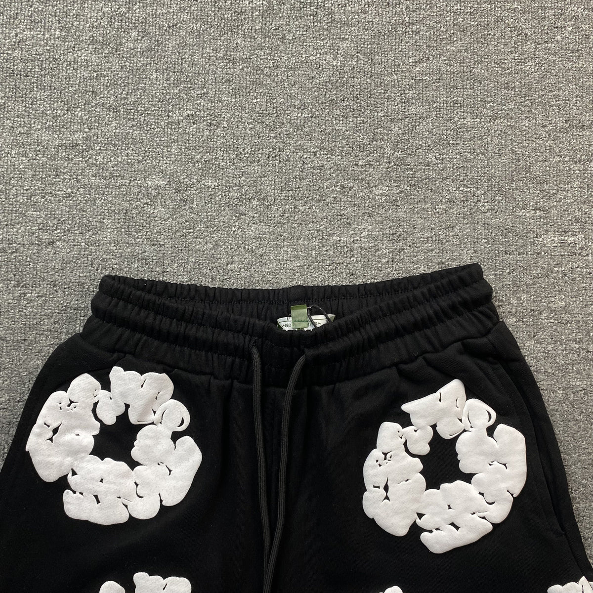 DENIM TEARS COTTON WREATH SHORTS BLACK - close up - replica sneakers