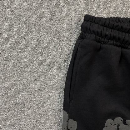 DENIM TEARS COTTON WREATH SWEATPANTS MONOCHROME BLACK - close up - replica sneakers