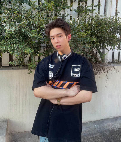 Gucci Graphic Logo T-Shirt (Black) - detail - replica sneakers