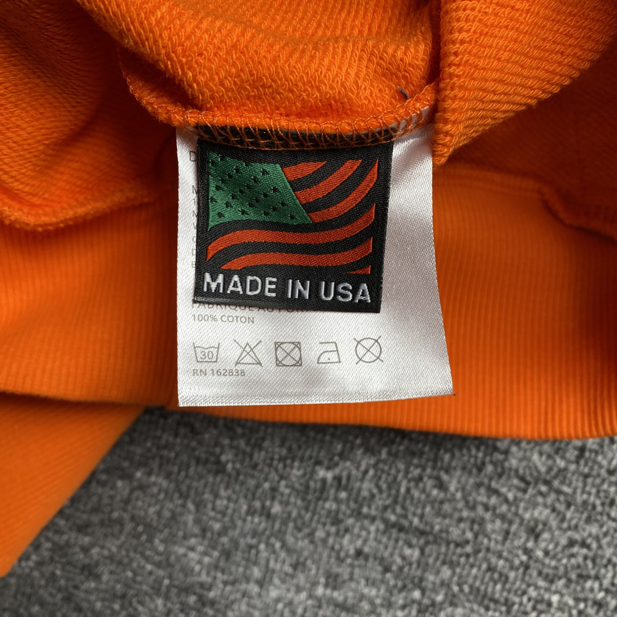 DENIM TEARS COTTON WREATH HOODIE ORANGE - detail - replica sneakers